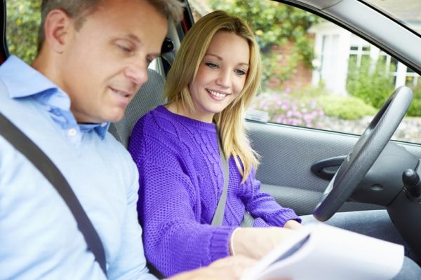 Student drivers ed training with driving instructor