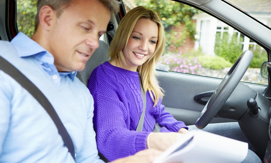 Student drivers ed training with driving instructor